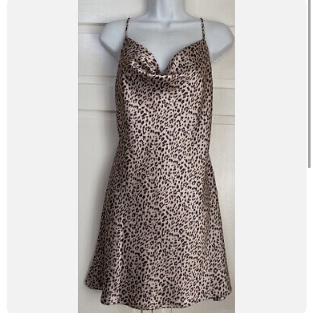 Silk, cheetah, mini dress with low back.